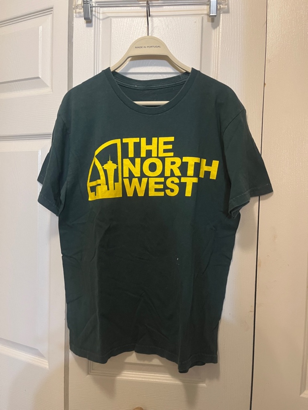 The North West crisis, clothing, collection Graphic Tee in Forest Green & Yellow